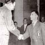 Al ritorno in patria fu ricevuto dal presidente della Repubblica Luigi Einaudi e dal presidente del Consiglio Alcide De Gasperi (nella foto)
